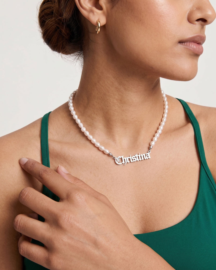 Model Image - Old English name necklace with freshwater pearl strand and custom name pendant worn on model