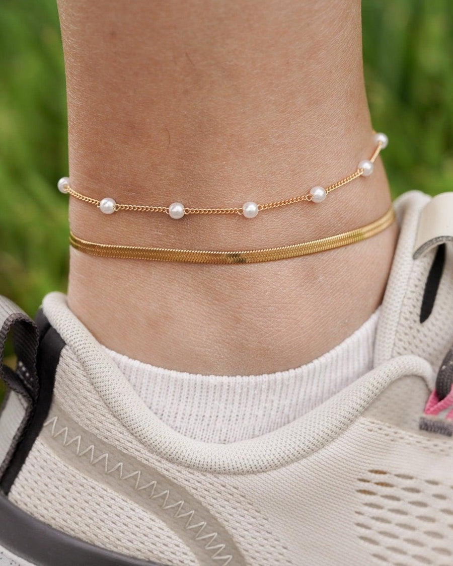 Style Image - Herringbone anklet layered with a pearl-accent anklet at the ankle