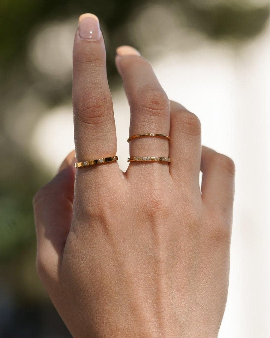 Style Image - Octo Stackable Ring worn in a layered ring look with sparkling stones on the hand