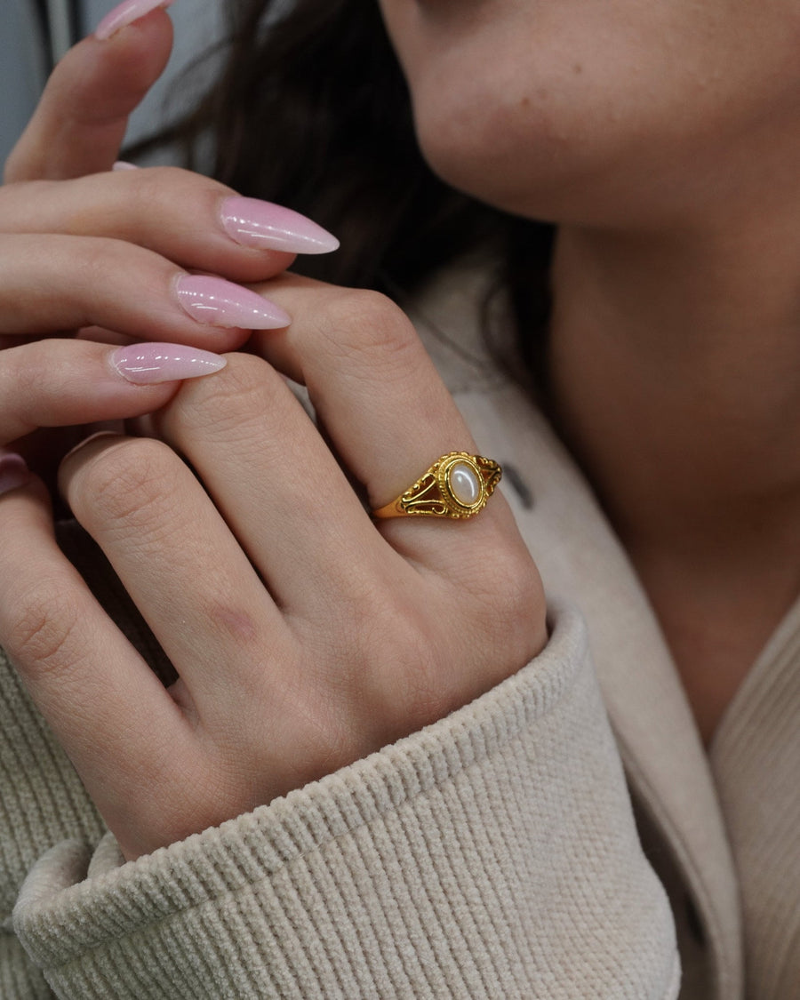 Style Image - Vintage Pearl Ring worn on hand with classic pearl centerpiece and detailed band