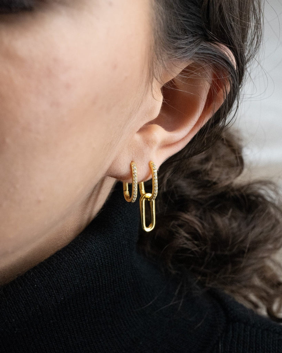 Model Image - Pave link hoop earring with interlocking link design and pave sparkle styled on the ear worn on model