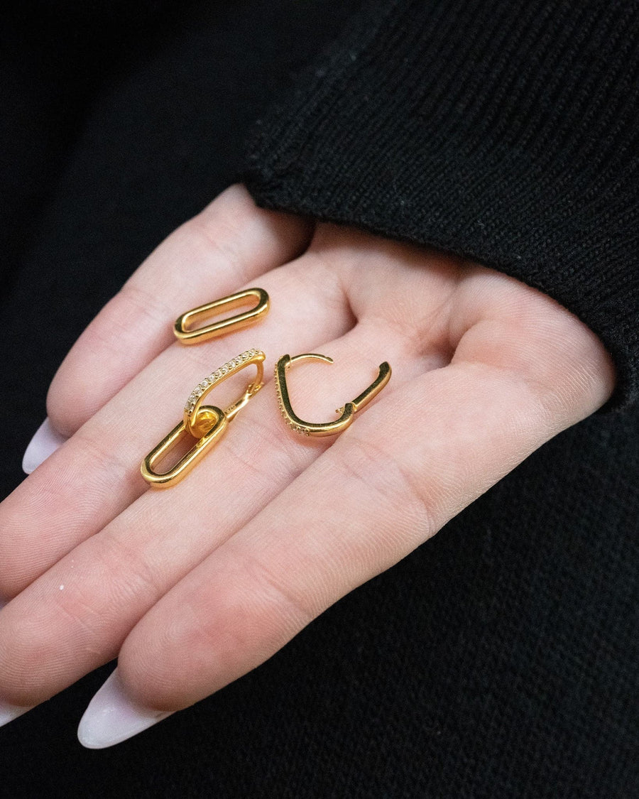 Detail Image - Pave Link Hoops in 14K gold plated interlocking link design shown in hand with open hoop closure