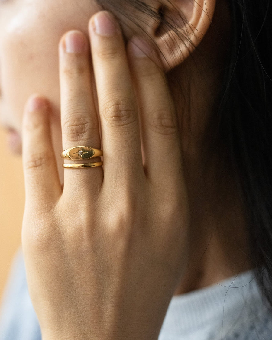 Style Image - North Star Ring worn on hand, showing the celestial band design in 18k gold plated stainless steel