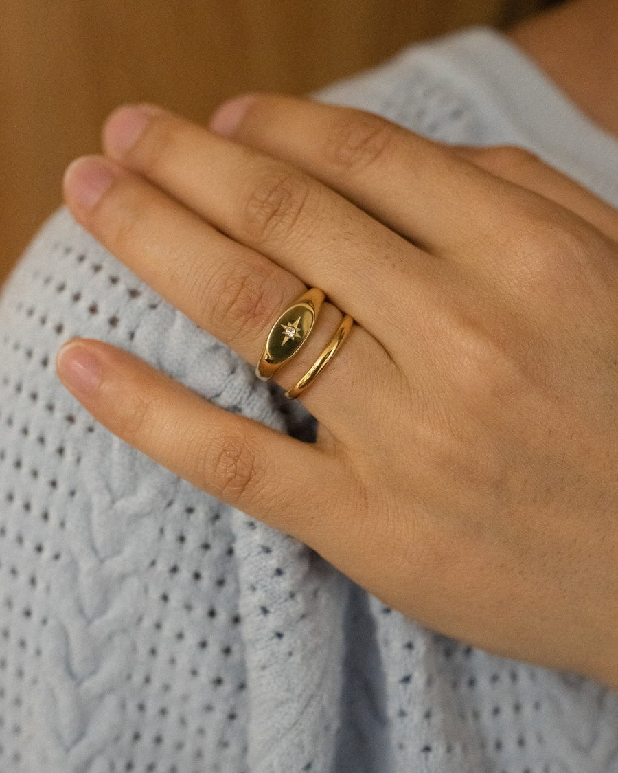 Model Image - North Star Ring with celestial design on the finger worn on model