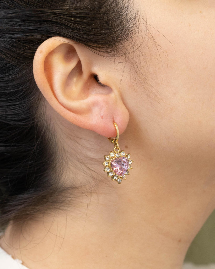 Style Image - Queen Heart Earrings with pink heart-shaped halo crystal pendant worn on the ear
