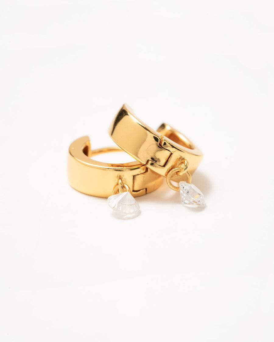 Detail Image - Tiny Diamond Hoops in 14k gold plated design with dangle accents, shown close up on a white background
