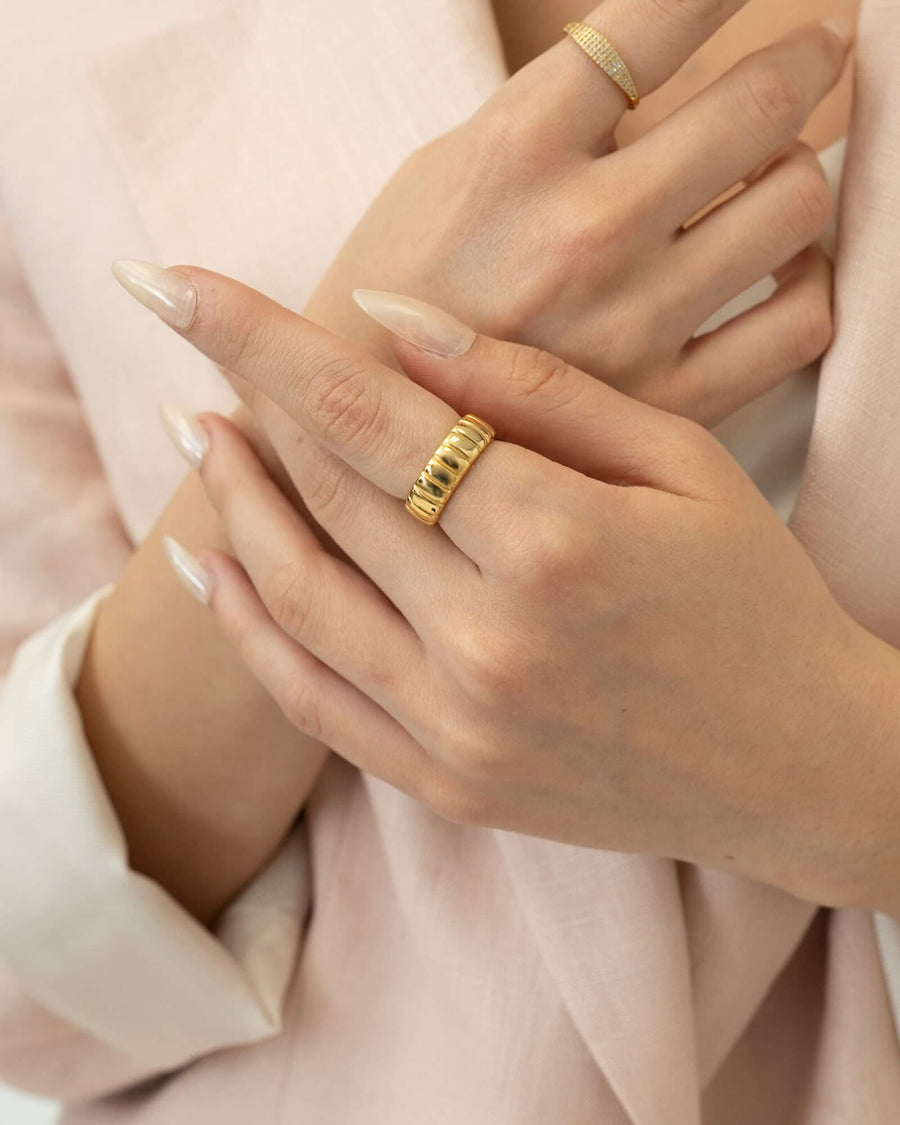 Style Image - Iconic Bold Ring in 14k gold plating worn on the hand with a second ring for a stacked look
