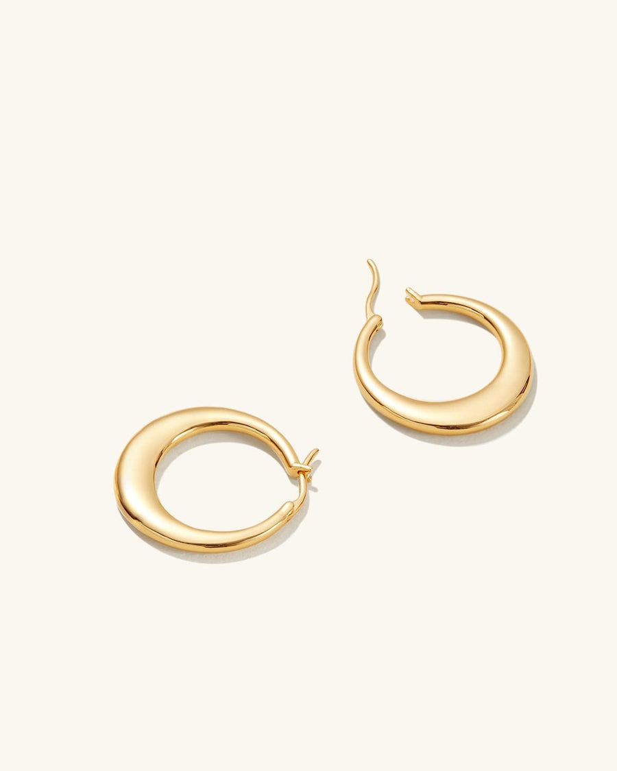 Detail Image - 14K gold plated hollow hoop earrings shown open to highlight the rounded 22 x 24 mm shape