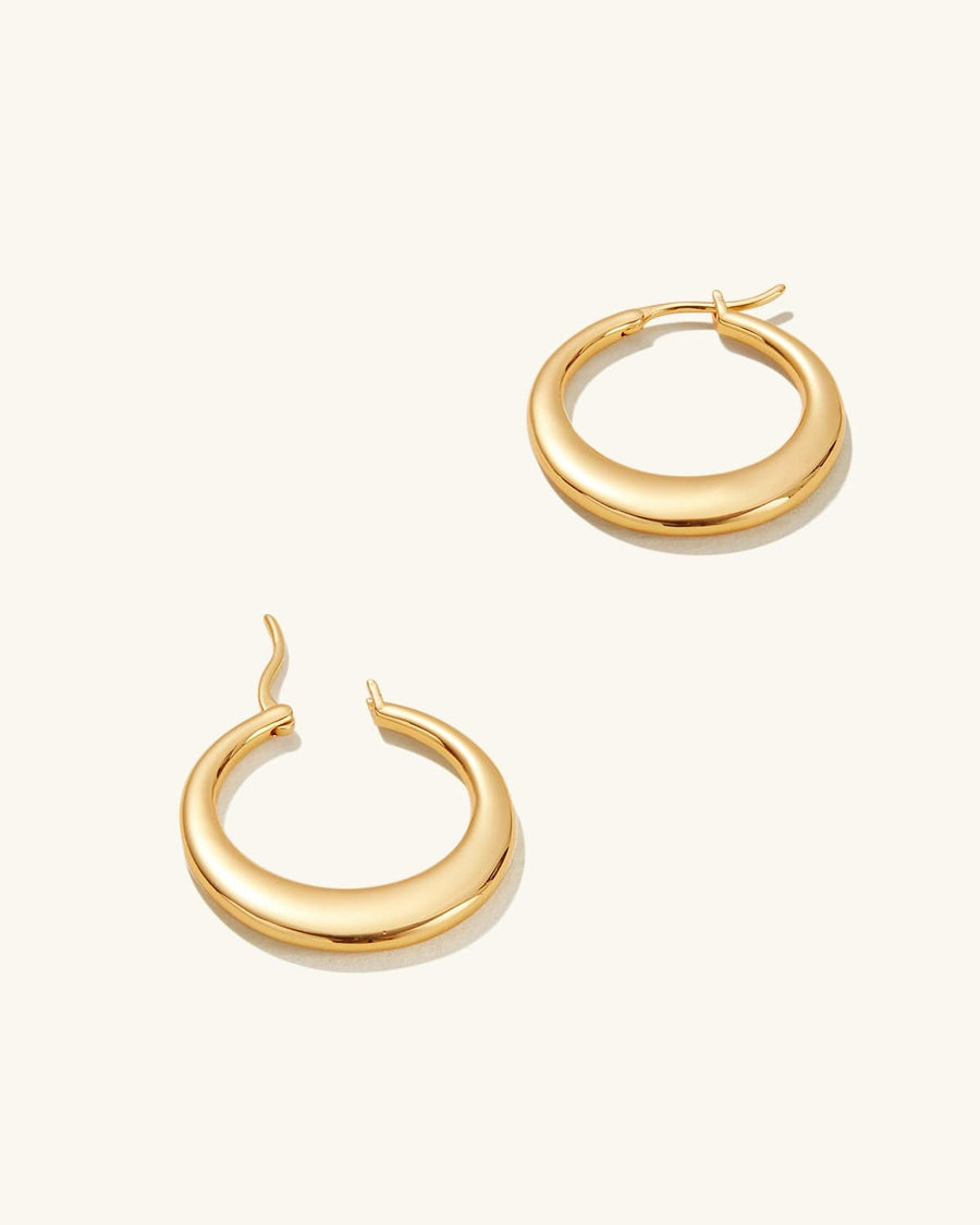 Detail Image - 14K gold plated hollow hoop earrings with curved open silhouette and clasp closure