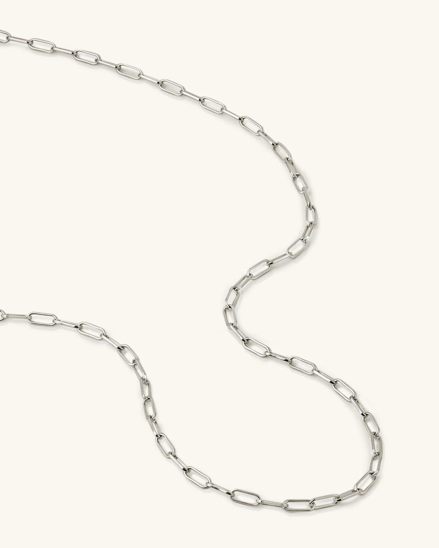 Model Image - Silver stainless steel paperclip chain necklace with elongated links worn on model