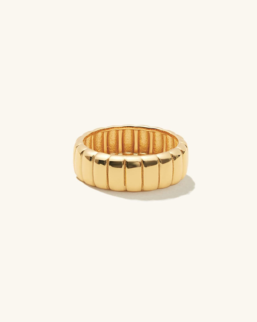 Model Image - Iconic Bold Ring with a wide rounded ribbed band in 14k gold plated design worn on model