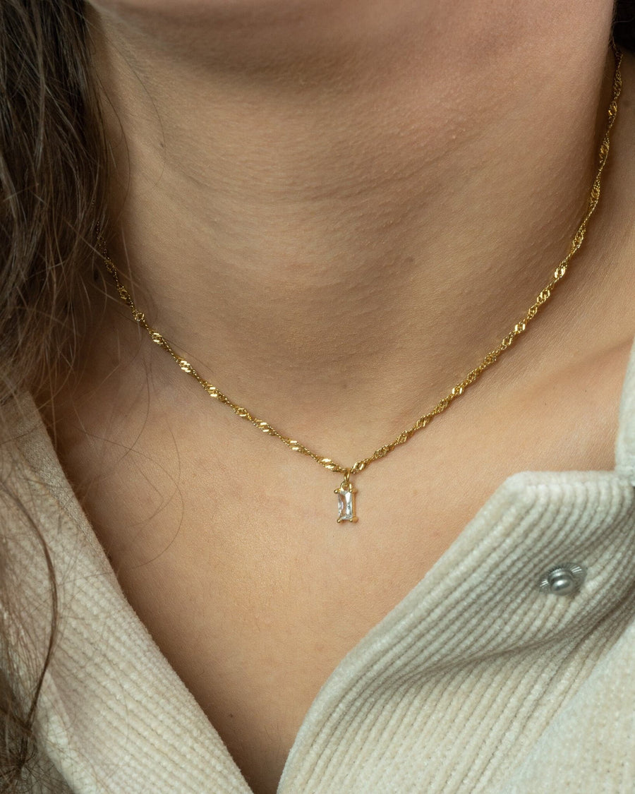 Style Image - Baguette Birthstone Necklace with diamond zircon pendant worn on a 14K gold plated chain