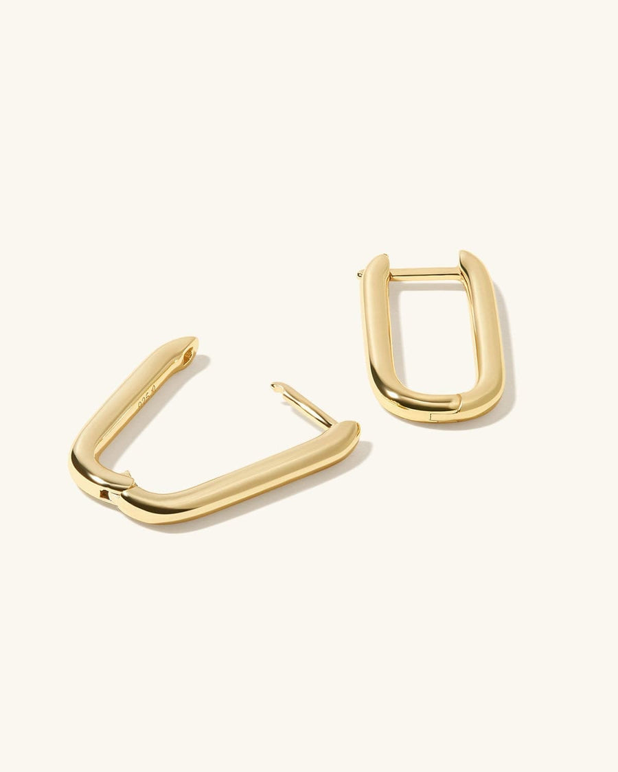 Detail Image - 14K gold plated U shaped earrings shown as a pair with hinged hoop closures
