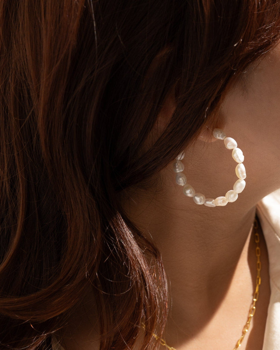 Style Image - Large Pearl Hoop Earring worn at the ear with freshwater pearls on a 46mm hoop