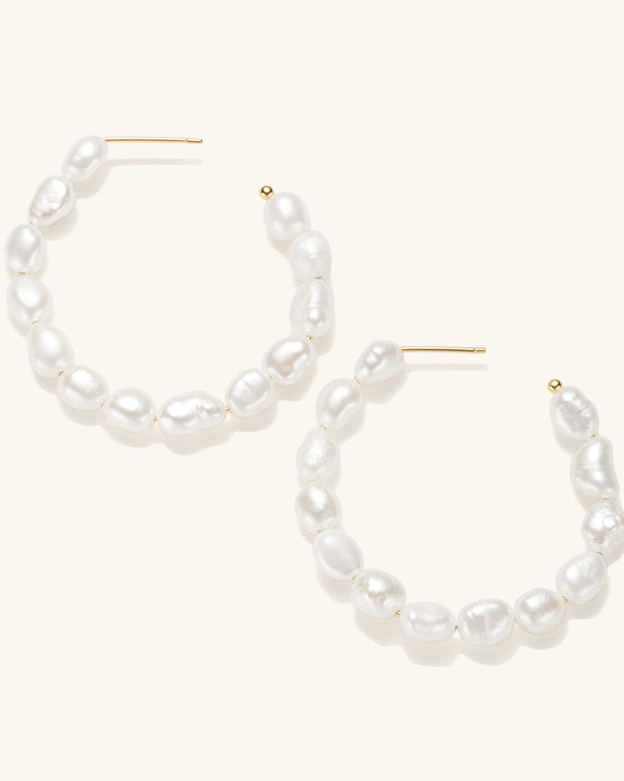 Detail Image - Large Pearl Hoop Earrings with freshwater pearls and 14K gold plated posts, shown as a pair on a light background