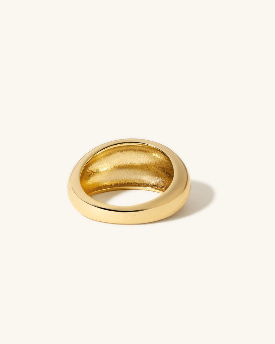 Detail Image - Dome Statement Ring in 14K gold plating showing the smooth rounded band and open interior from a low angle