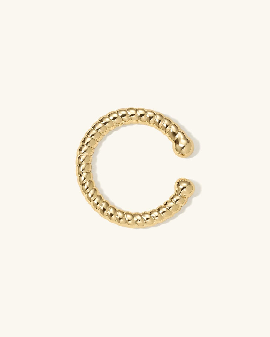 Detail Image - Twisted 14K gold plated ear cuff with open cuff shape and textured ridged design