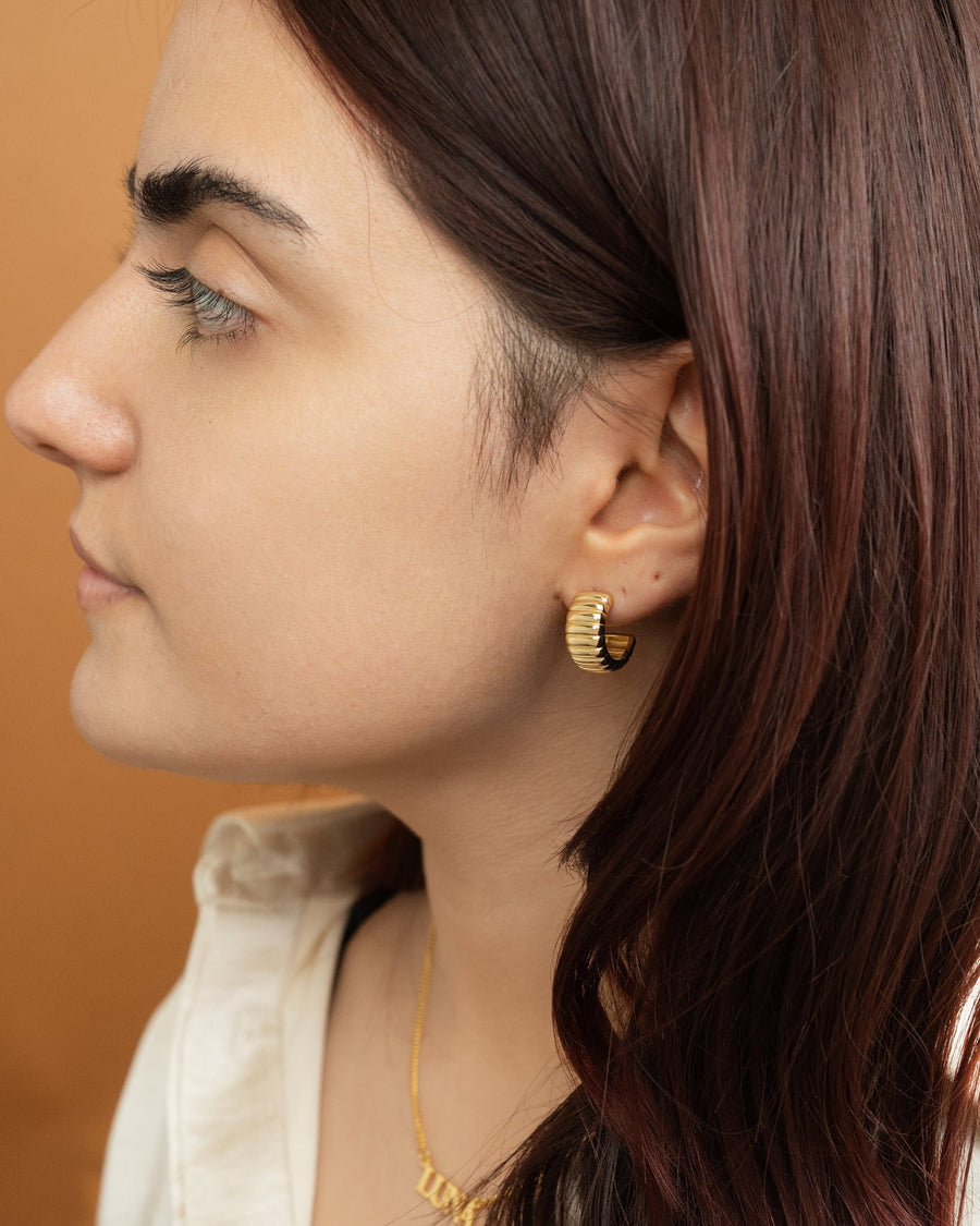 On-ear Image - Bold ribbed hoop earring worn on the ear, 18mm x 18mm x 8.5mm