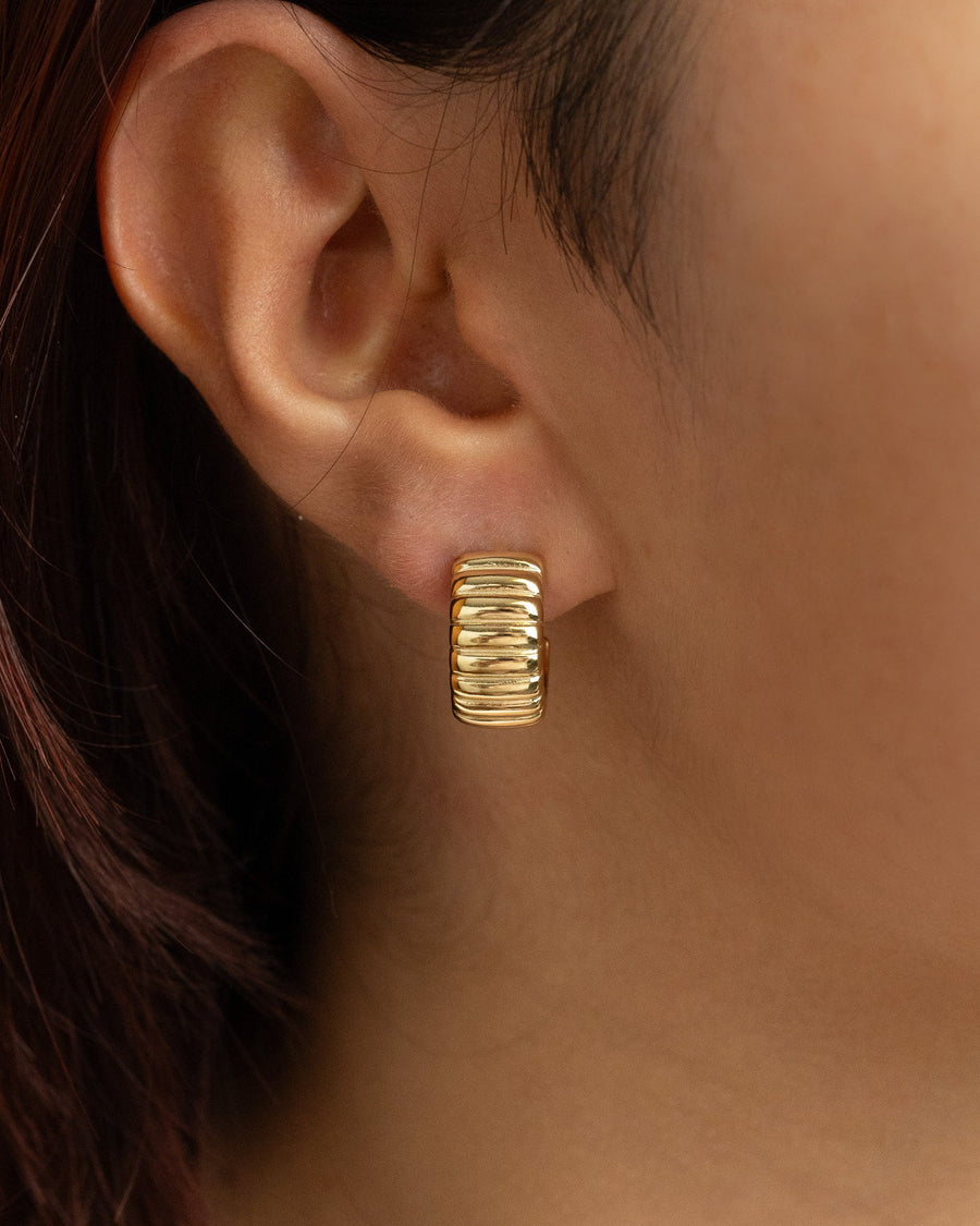On-ear detail - Bold Ribbed Hoop earring with sculpted ribbed texture on the ear