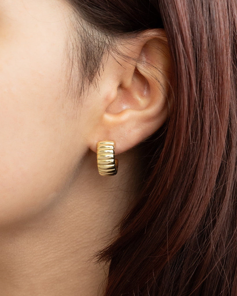 Model Image - close-up of Bold Ribbed Hoops earring on the ear worn on model