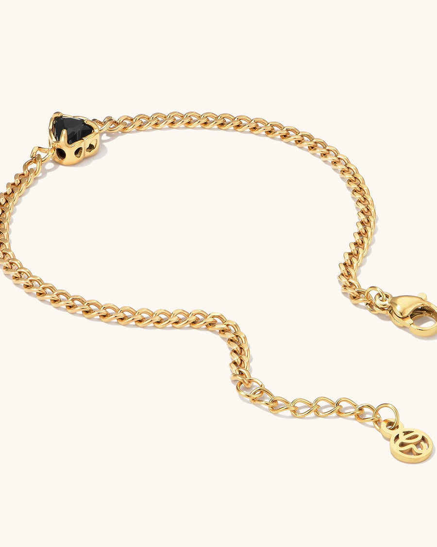 Detail Image - Mini black heart bracelet with chain, extender, and clasp in 18k gold plated stainless steel