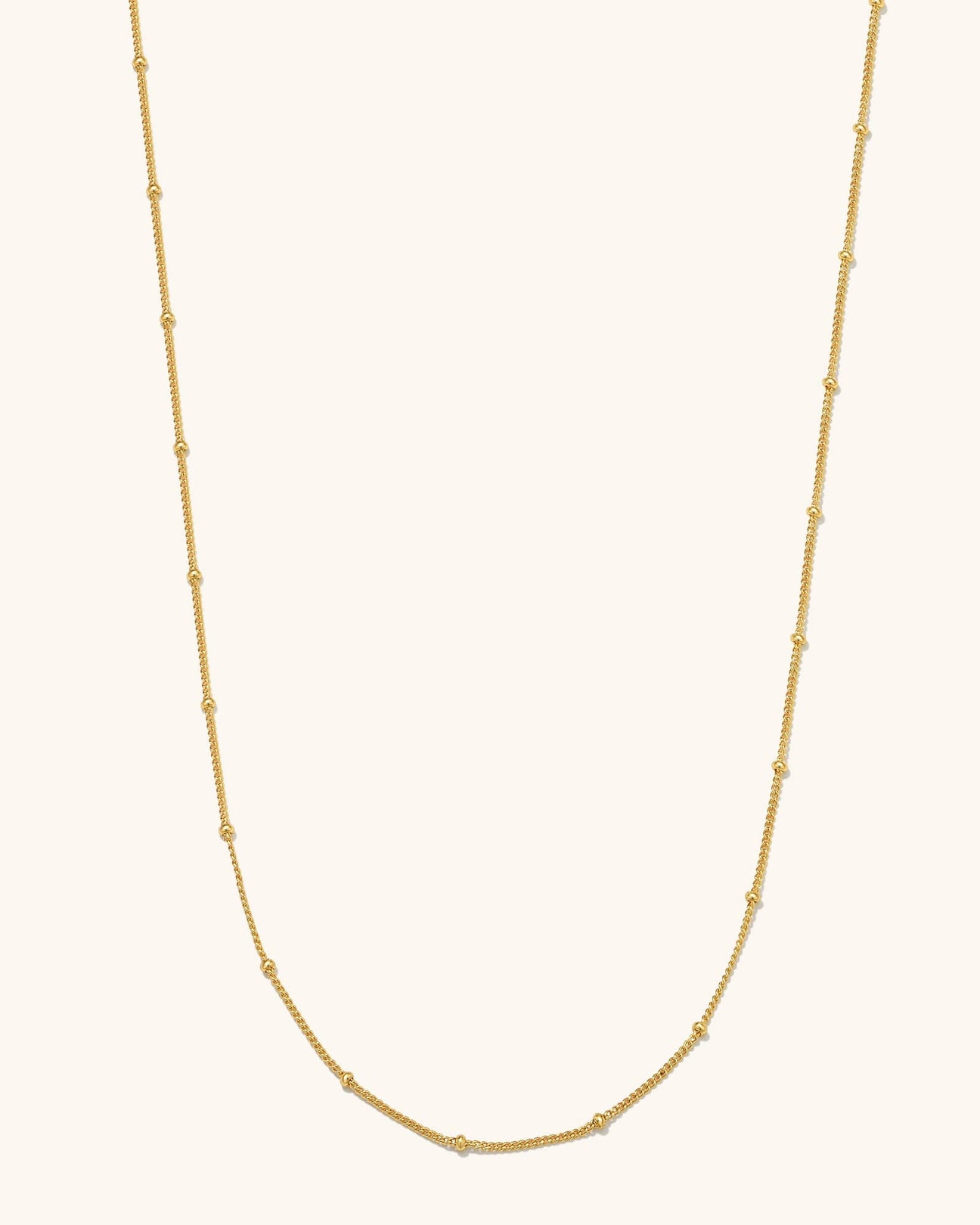 Main Image - 14K gold plated satellite chain necklace with delicate bead accents on a light background