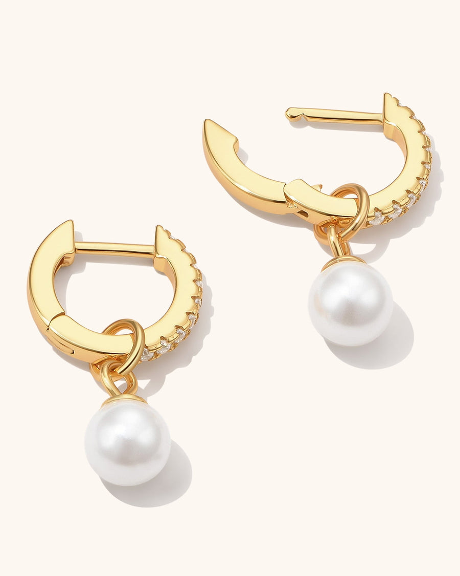 Detail Image - 14K gold plated pearl huggie drop earrings with 12 mm hoops shown from the side