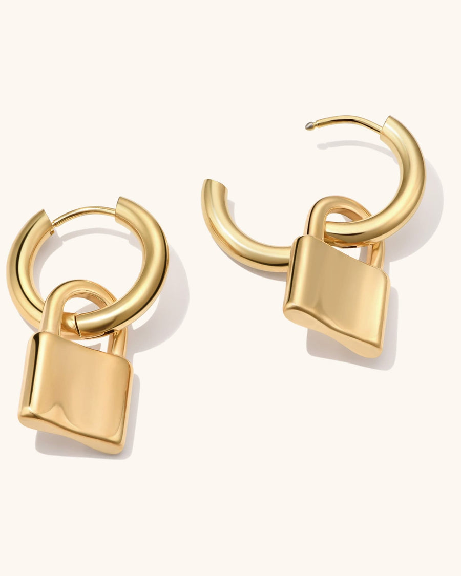 Detail Image - Padlock hoops with dangling padlock charms in 18k gold plated stainless steel
