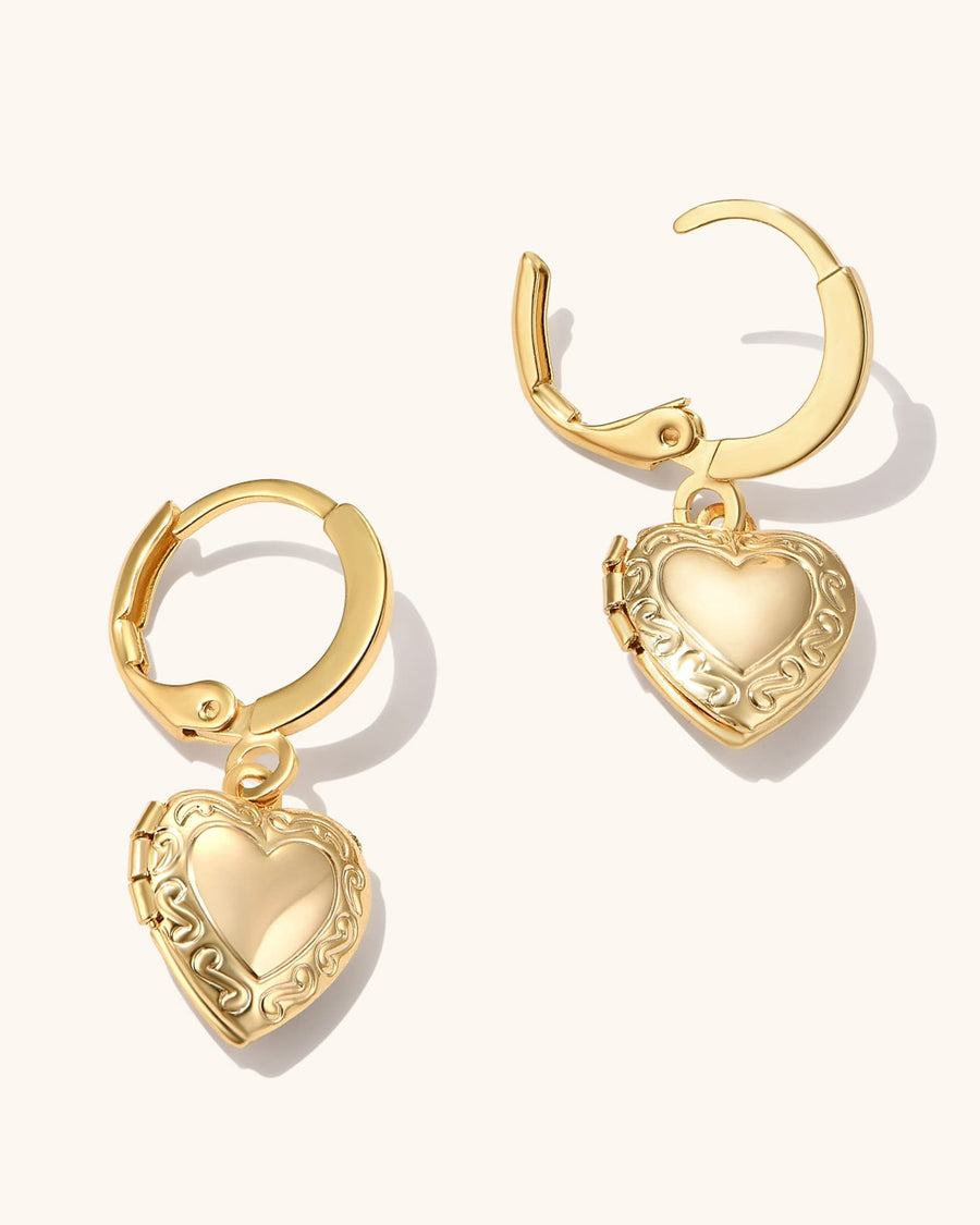 Close-up of 18k gold plated mini heart locket earrings with hinged hoops