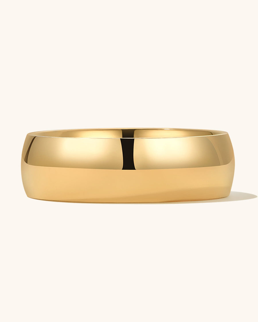 Model Image - 6mm gold plated band ring styled on the hand worn on model