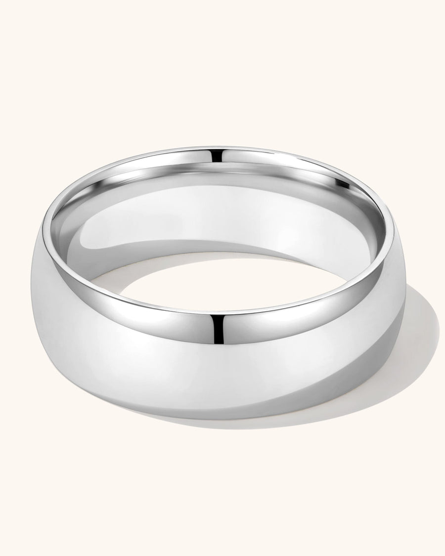 Model Image - 6 mm silver band ring shown on the hand worn on model