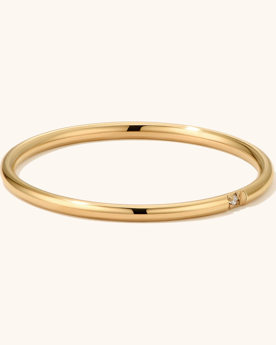 Detail Image - Single stackable ring with sleek minimalist band in 18k gold plated stainless steel