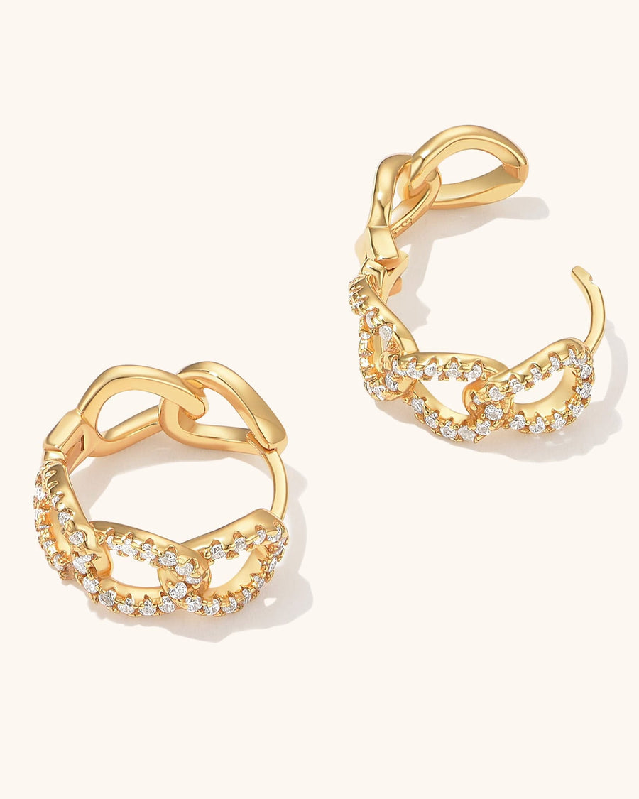 Detail Image - 14K gold plated paved curb huggie hoop earrings shown as a pair with interlocking chain-link design