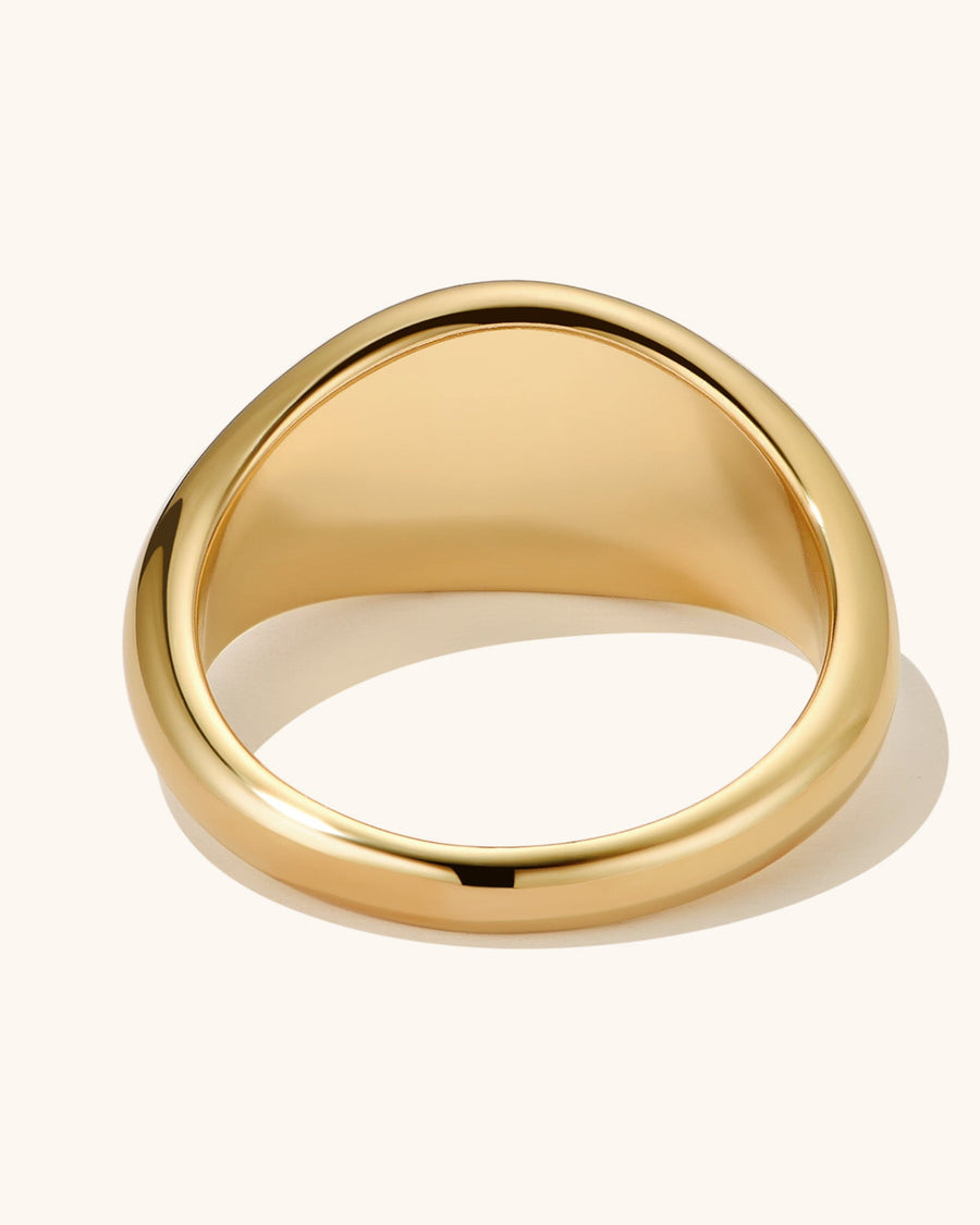 Detail Image - Pearl ring with a smooth 18k gold plated stainless steel band shown from the back