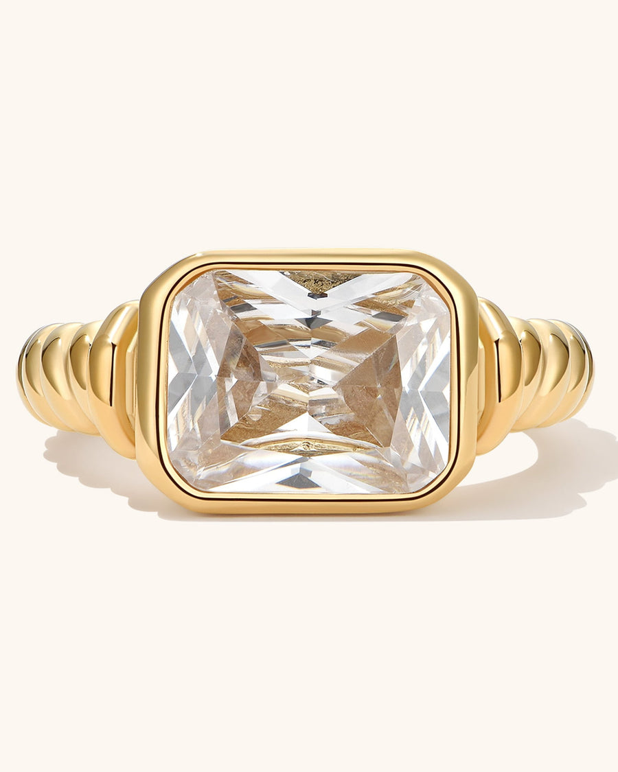 Detail Image - Twisted signet ring with diamond centerpiece and ribbed band design.