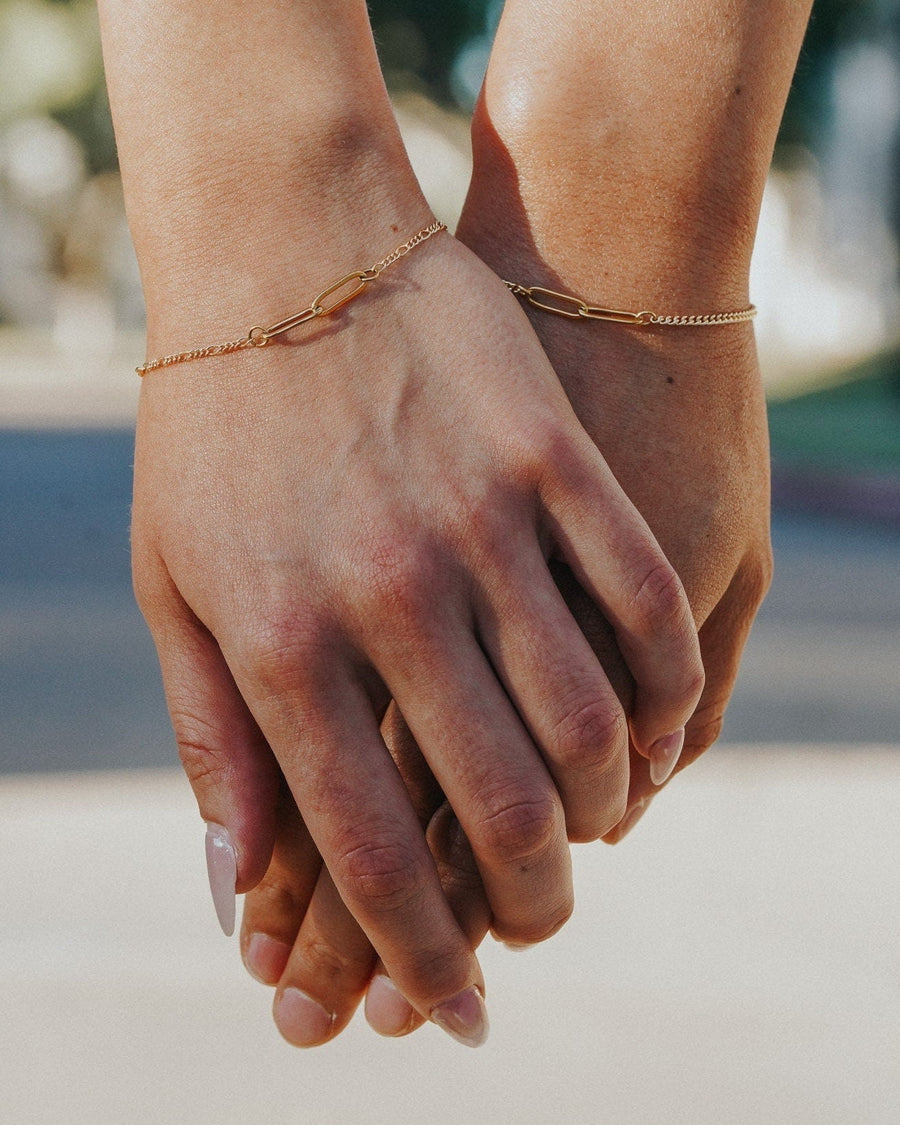 Style Image - Couple Baby Curb Bracelets in 18k gold plated stainless steel worn while holding hands