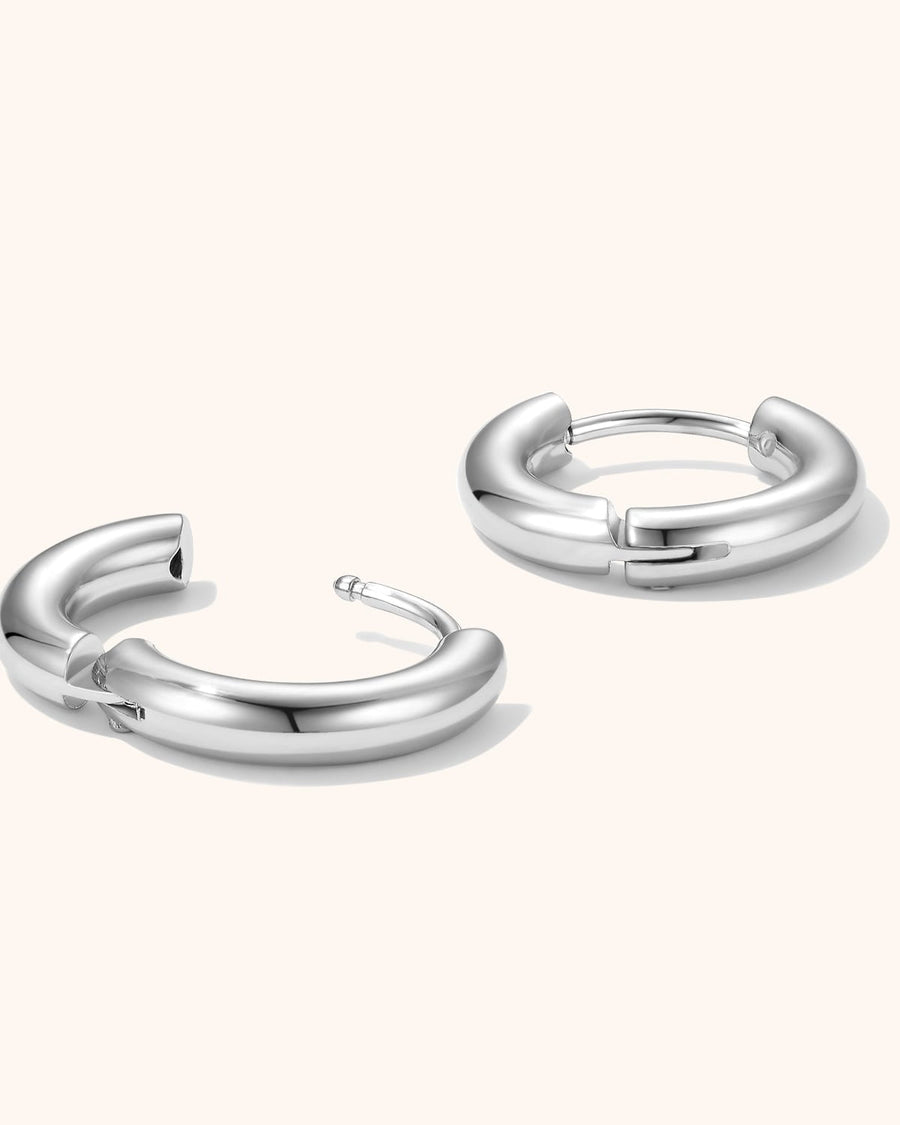 Detail Image - Simple Hoops 10mm silver earrings shown open with curved clasp closure