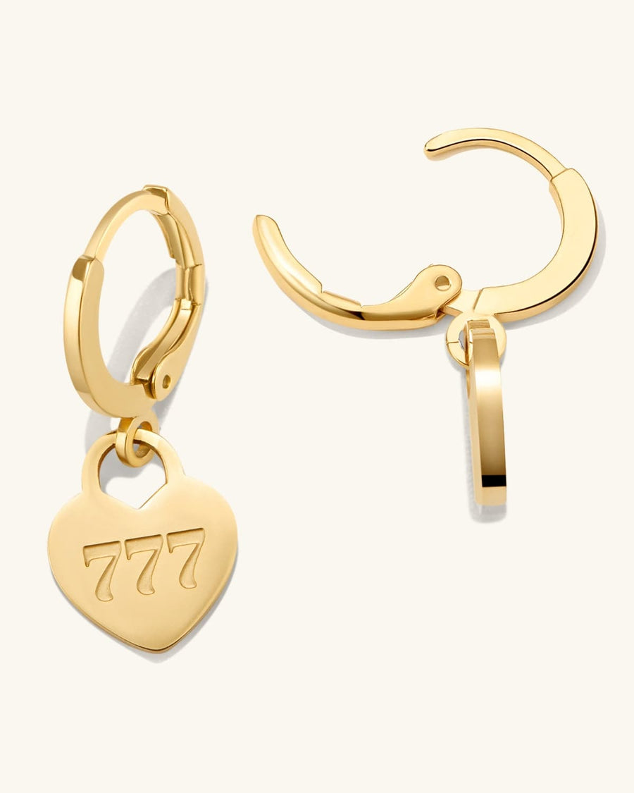 Detail Image - 14K gold plated hoop earrings with heart pendants engraved with angel number 777