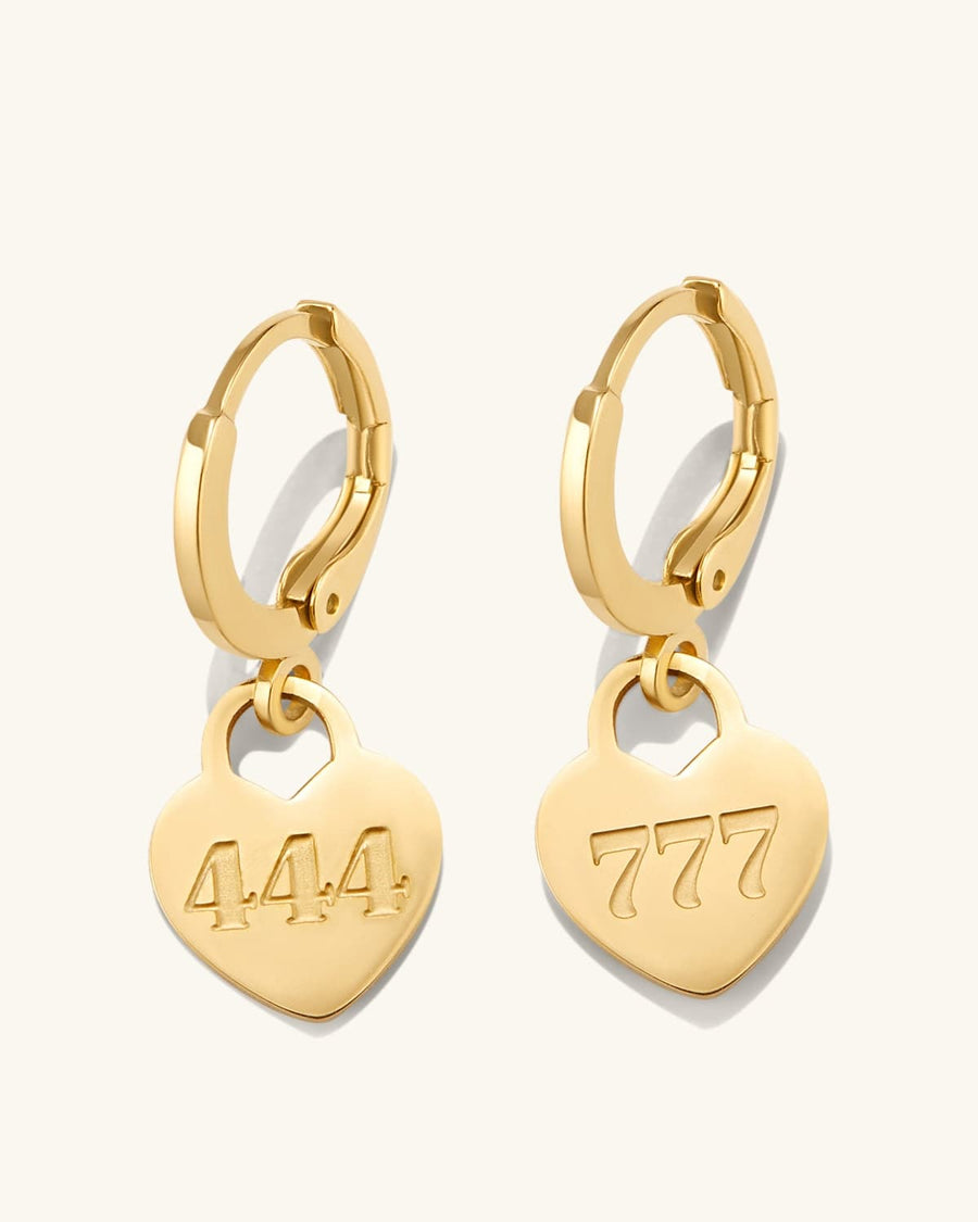 Detail Image - Gold plated hoop earrings with heart pendants engraved with 444 and 777 angel numbers