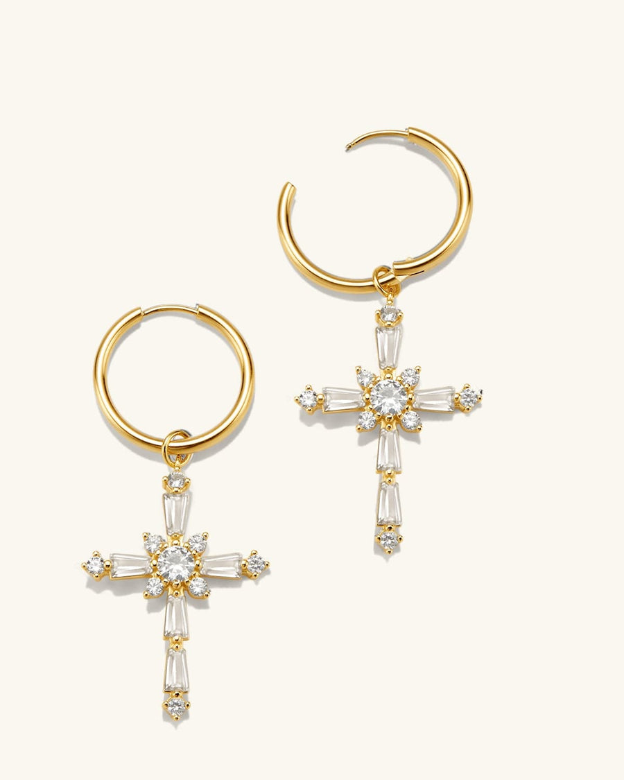 Detail Image - 14K gold plated CZ cross earrings shown as a pair with hoop closures