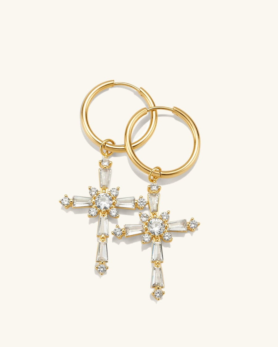 Detail Image - Gold plated CZ cross earrings with hoop closures, shown as a pair on a light background