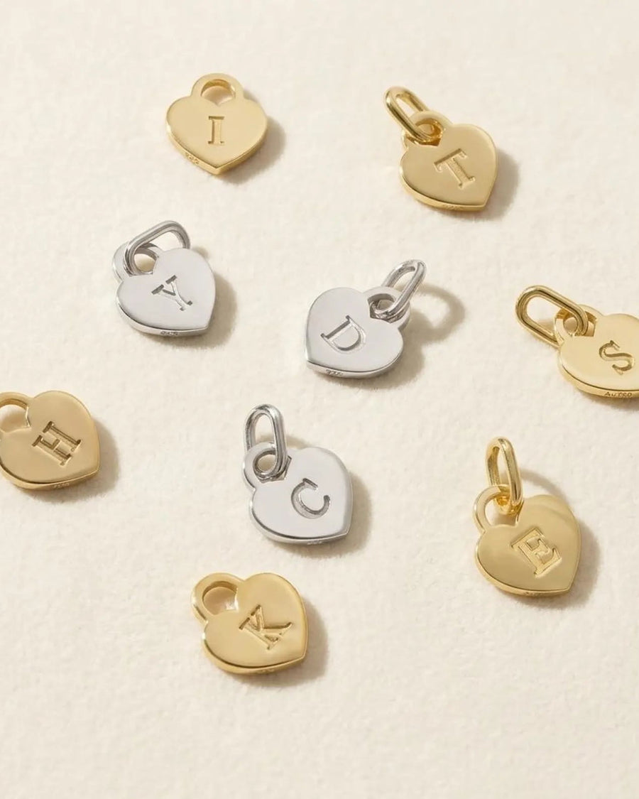 Detail Image - Engravable heart earring pendants shown with single-letter engraving examples.