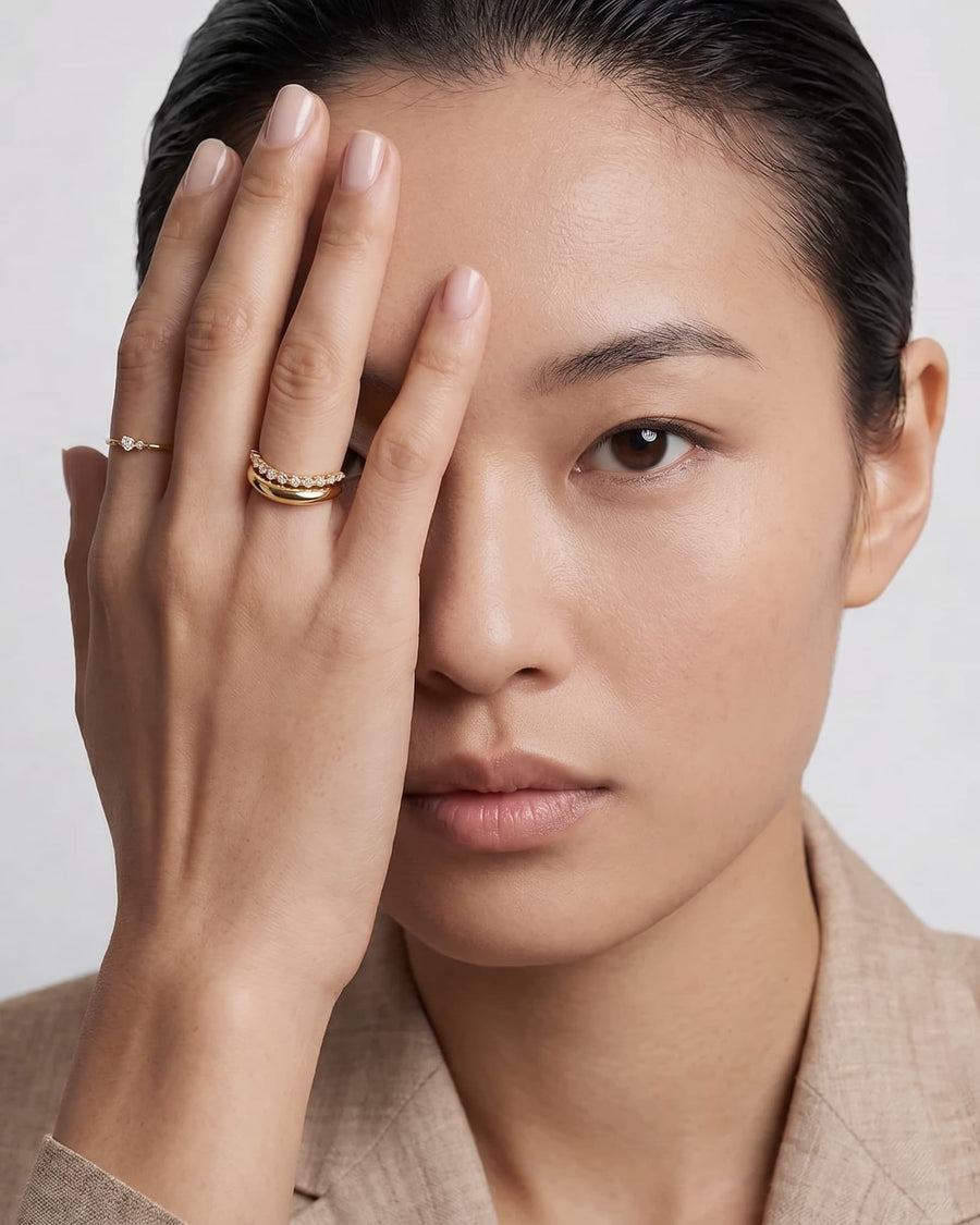 Style Image - Round lab-grown diamond open bezel ring worn stacked on the hand with other gold rings