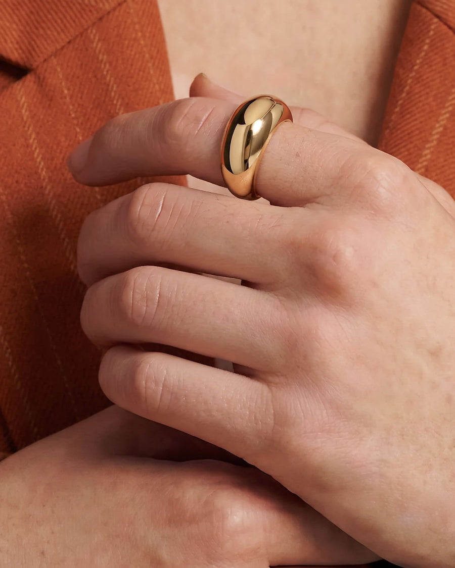 Style Image - 14k solid gold sculpted dome ring worn on the finger with a smooth high-polish finish