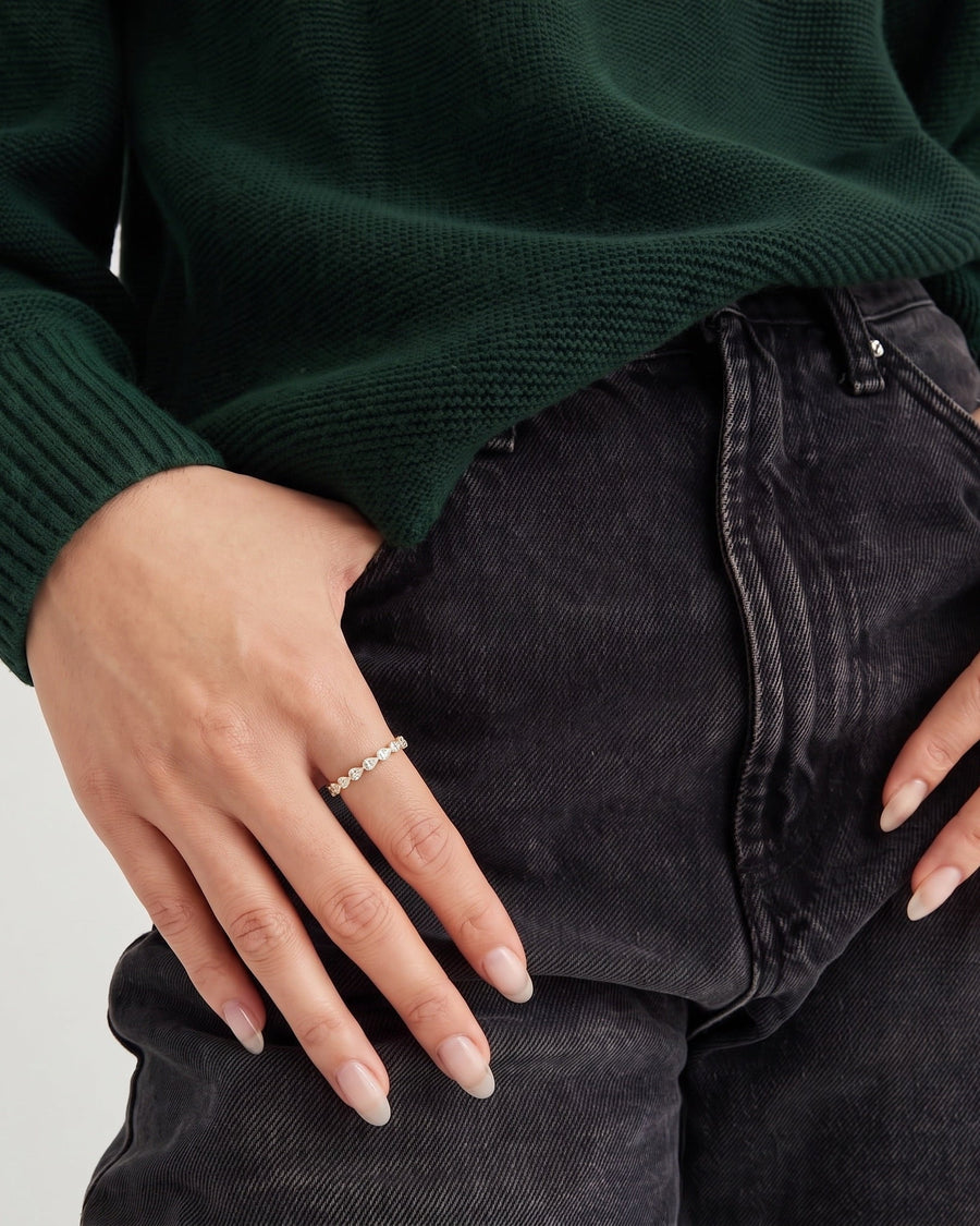 Model Image - Pear Lab Grown Diamond Eternity Ring worn on model