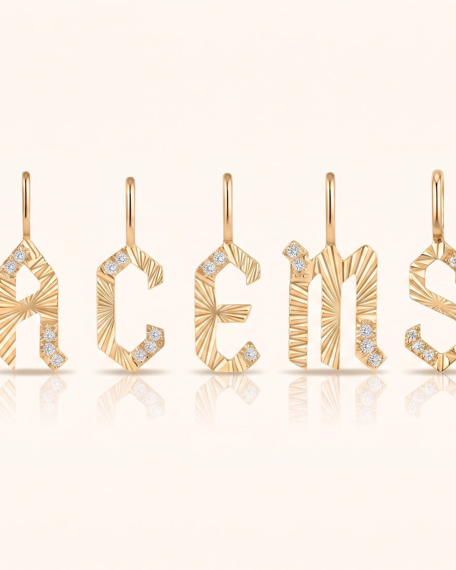 14k solid gold letter charms with radial detailing and round lab-grown diamond accents in assorted initials