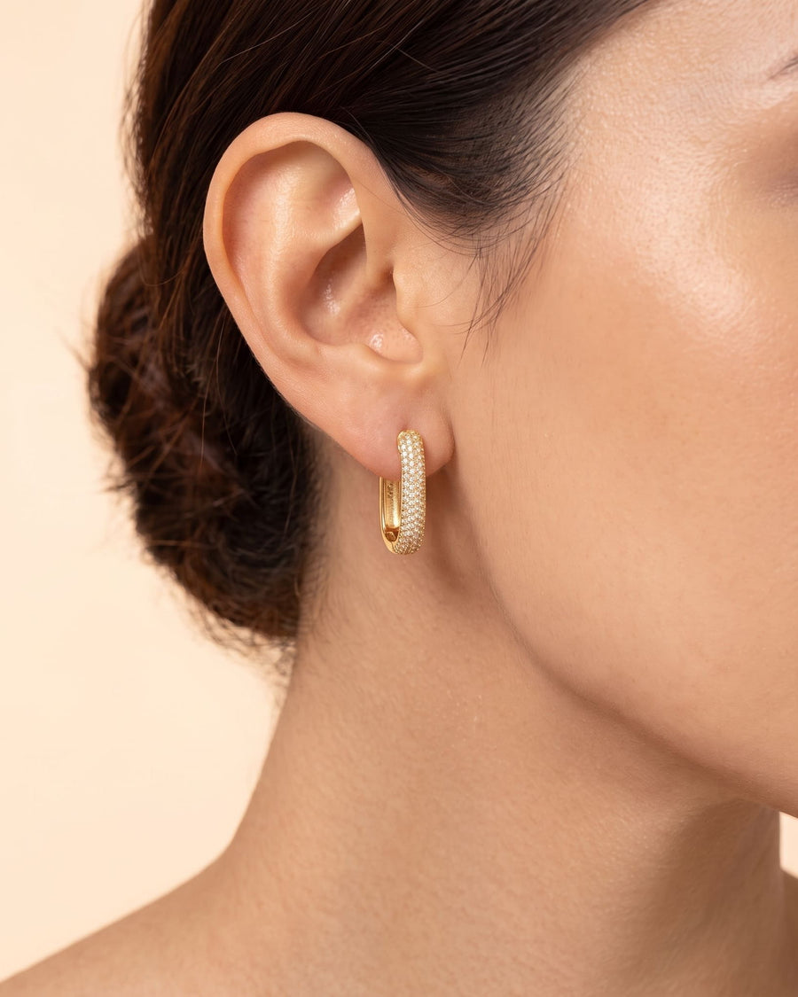 Model Image - 14K Gold Pave Link Hoop Earring worn on the ear with a compact rounded rectangular profile worn on model